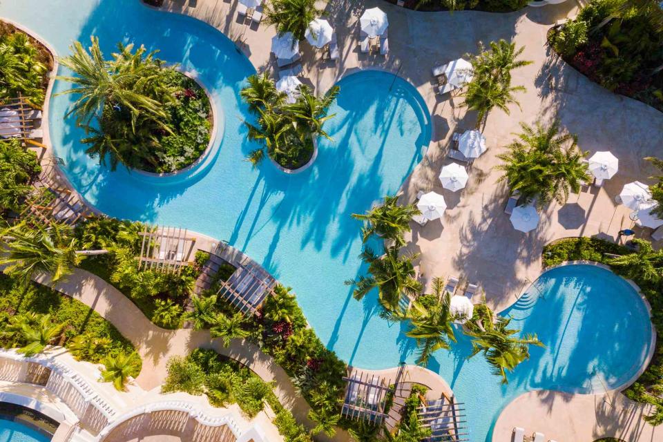 <p>Courtesy of Rosewood Baha Mar</p> The Rosewood Baha Mar Lagoon pool—perfect for cooling off after a match.