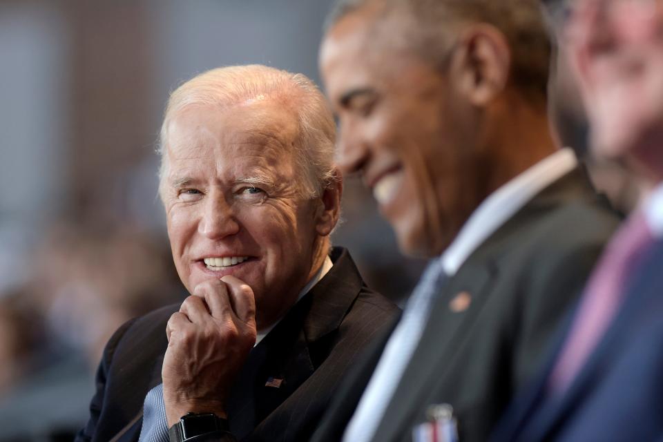 Neither Joe Biden, left, nor Barack Obama, seen in a 2017 file photo, is under criminal investigation, the U.S. attorney general said Monday.