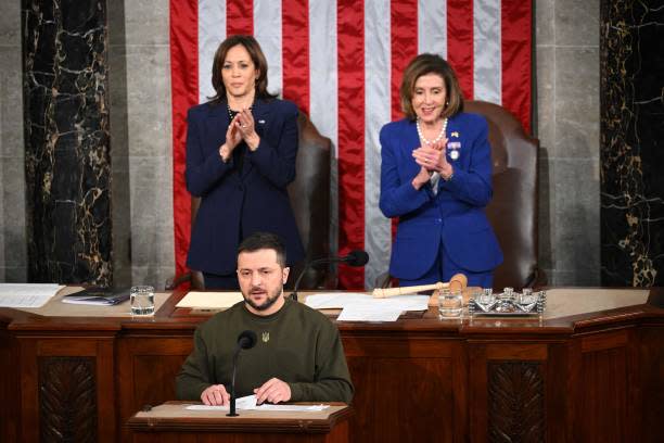 File: Ukraine’s president Volodymyr Zelensky addresses the US Congress as US vice president Kamala Harris and US House speaker Nancy Pelosi applaud at the US Capitol in Washington, DC on 21 December 2022 (AFP via Getty Images)