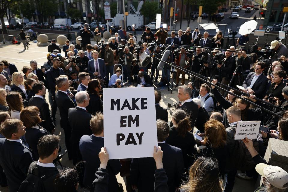 Lawyers representing Dominion Voting Systems talk to reporters. <a href="https://www.gettyimages.com/detail/news-photo/lawyers-representing-dominion-voting-systems-talk-to-news-photo/1483128376?adppopup=true" rel="nofollow noopener" target="_blank" data-ylk="slk:Chip Somodevilla/Getty Images News via Getty Images;elm:context_link;itc:0;sec:content-canvas" class="link ">Chip Somodevilla/Getty Images News via Getty Images</a>