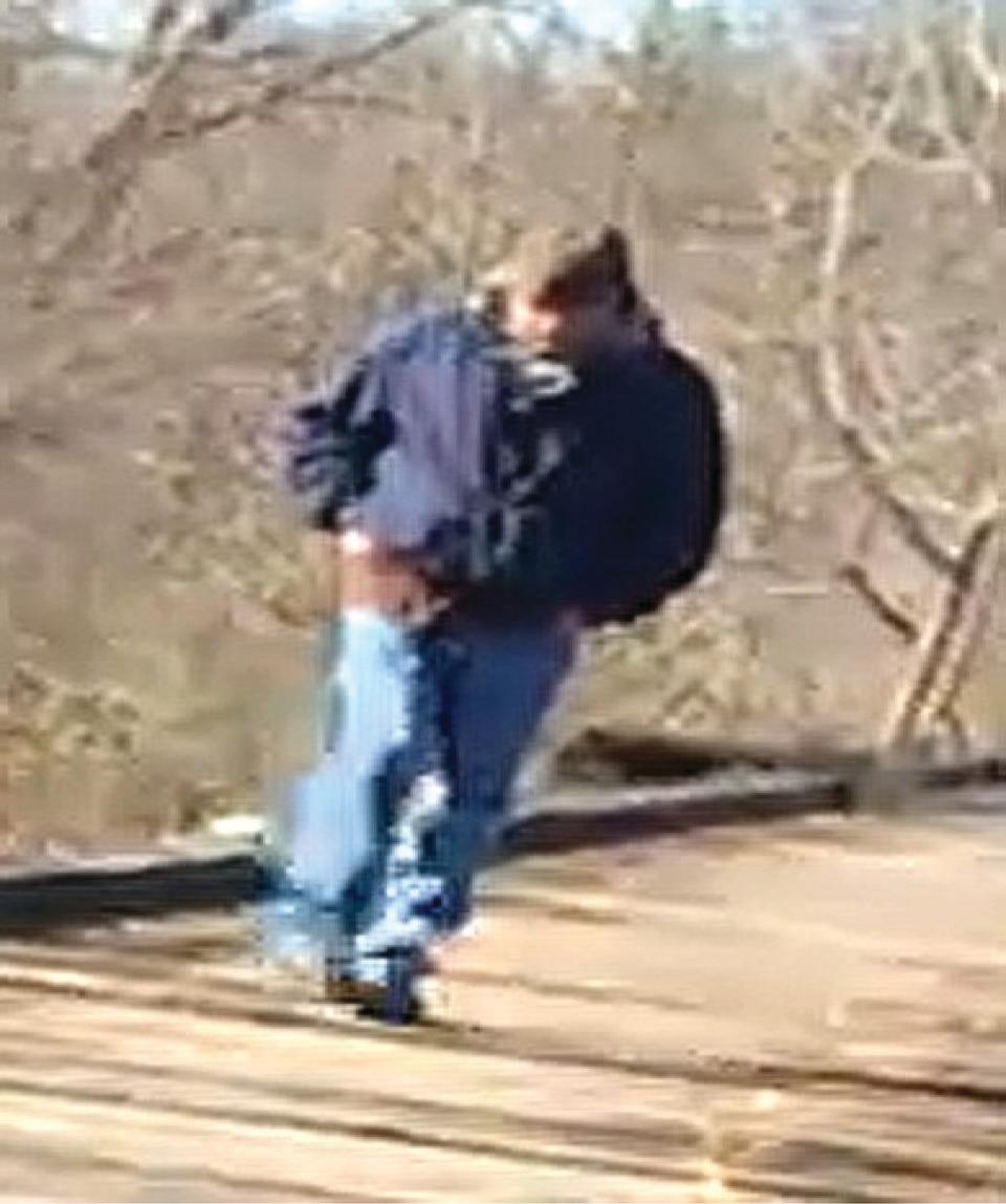 A photograph, distributed by law enforcement officers, of a person observed on the Delphi Historic Trail around the time Abby and Libby were killed.<span class="copyright">Indiana State Police</span>