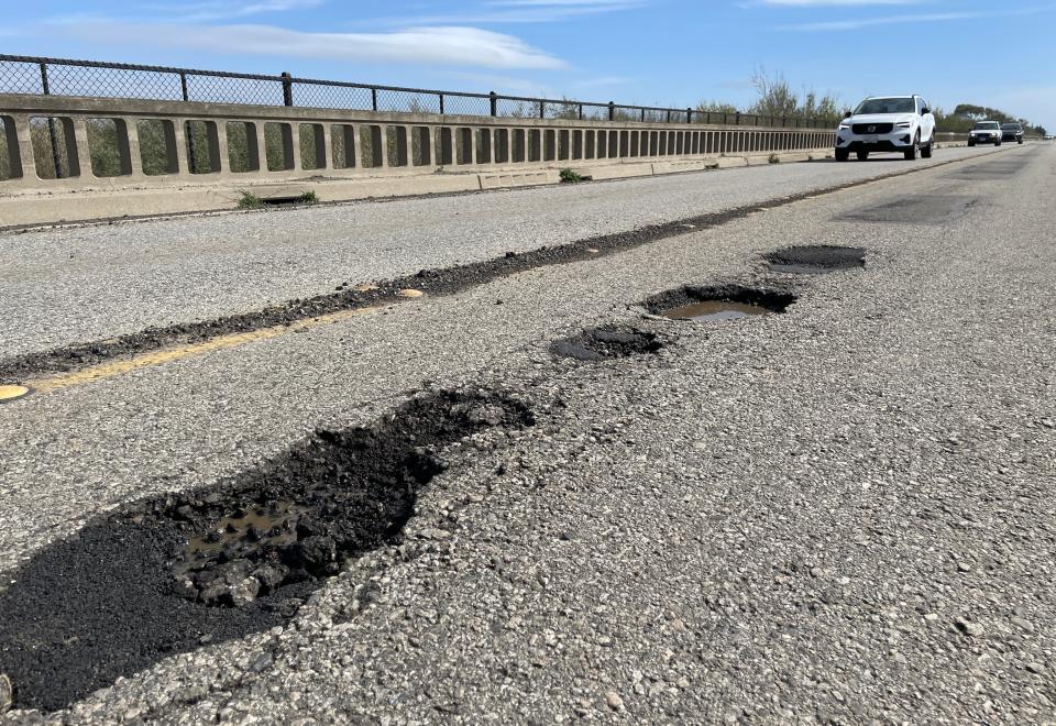 Potholes emerged after recent rains along the Santa Clara River bridge on Harbor Boulevard, as seen Wednesday.