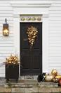 <p>What's it take to achieve this shimmering display? Gourds, pumpkins, and a gilding kit! When all these metallic colors come together, your entrance will turn into one hot spot.</p><p><strong><a href="https://www.countryliving.com/diy-crafts/how-to/g616/how-to-guild-a-pumpkin/" rel="nofollow noopener" target="_blank" data-ylk="slk:Get the tutorial;elm:context_link;itc:0;sec:content-canvas" class="link ">Get the tutorial</a>.</strong> </p>