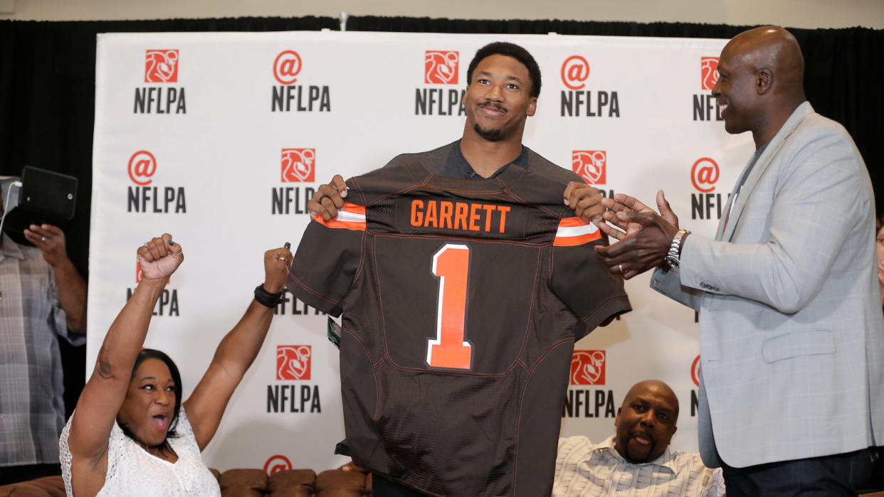 Mandatory Credit: Photo by AP/Shutterstock (8721295f)Myles Garrett, Audrey Garret, Lawrence Garrett, Bruce Smith IMAGE DISTRIBUTED FOR FOR NFLPA - Former No.