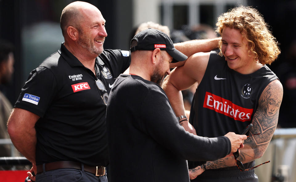 Craig Kelly, pictured here with Beau McCreery at a Collingwood training session.