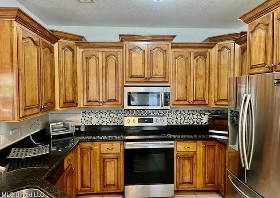 The kitchen of this home for sale on Ryegrass Lane in St. Martin comes with stainless steel appliances.
