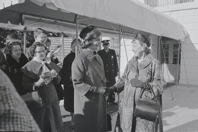 <p>Bettmann Archive/Getty</p> Jackie Kennedy and Mamie Eisenhower