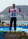 Aug 18, 2016; Rio de Janeiro, Brazil; Alistair Brownlee (GBR) celebrates winning the gold medal during the men's triathlon in the Rio 2016 Summer Olympic Games at Fort Copacabana. Mandatory Credit: Eric Seals-USA TODAY Sports