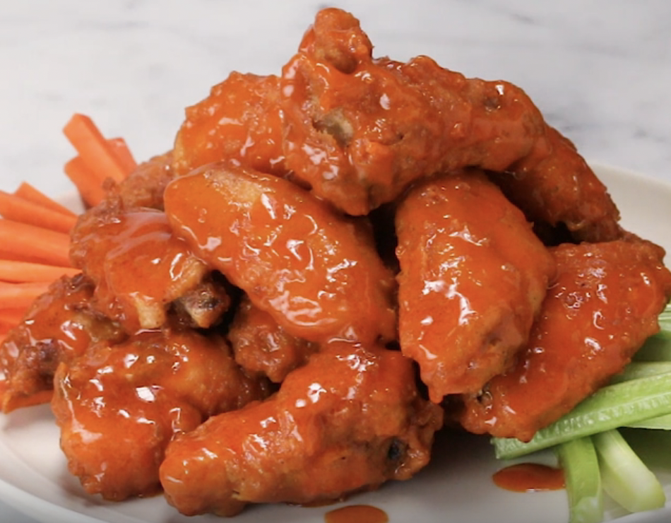 <div><p>"Are Buffalo wings American? Because that's modern-day Ambrosia."</p><p>—u/<a href="https://go.redirectingat.com?id=74679X1524629&sref=https%3A%2F%2Fwww.buzzfeed.com%2Fandyneuenschwander%2Ffavorite-american-foods-of-non-americans&url=https%3A%2F%2Fwww.reddit.com%2Fuser%2FCronkleDonker%2F&xcust=6250691%7CBF-VERIZON&xs=1" rel="nofollow noopener" target="_blank" data-ylk="slk:CronkleDonker;elm:context_link;itc:0;sec:content-canvas" class="link "><u>CronkleDonker</u></a></p></div><span> Tasty / BuzzFeed</span>