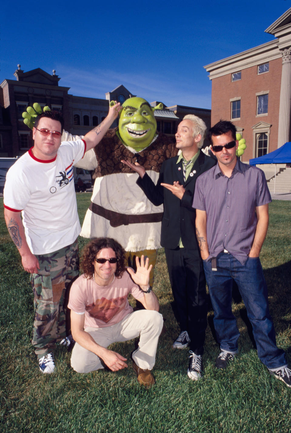 From left, Smash Mouth members Steve Harwell, Paul De Lisle, Michael Urbano and Greg Camp of Smash Mouth, with Shrek standing at center. 