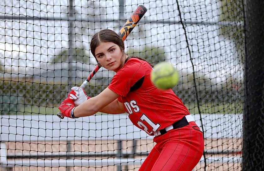 Whittier Christian senior Aleena Garcia works in the batting cage.