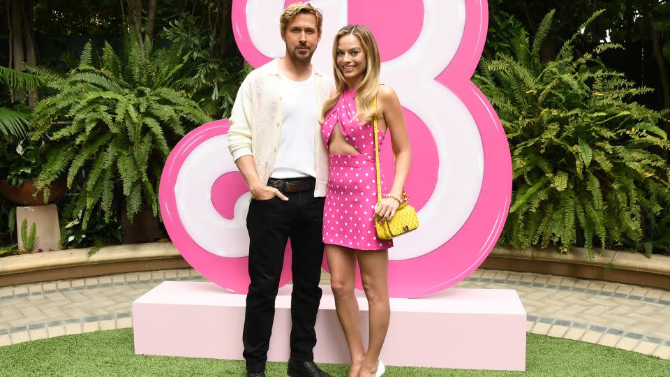 Ryan Gosling and Robbie at a press event in Los Angeles, where Robbie wore Valentino. - Jon Kopaloff/Getty Images