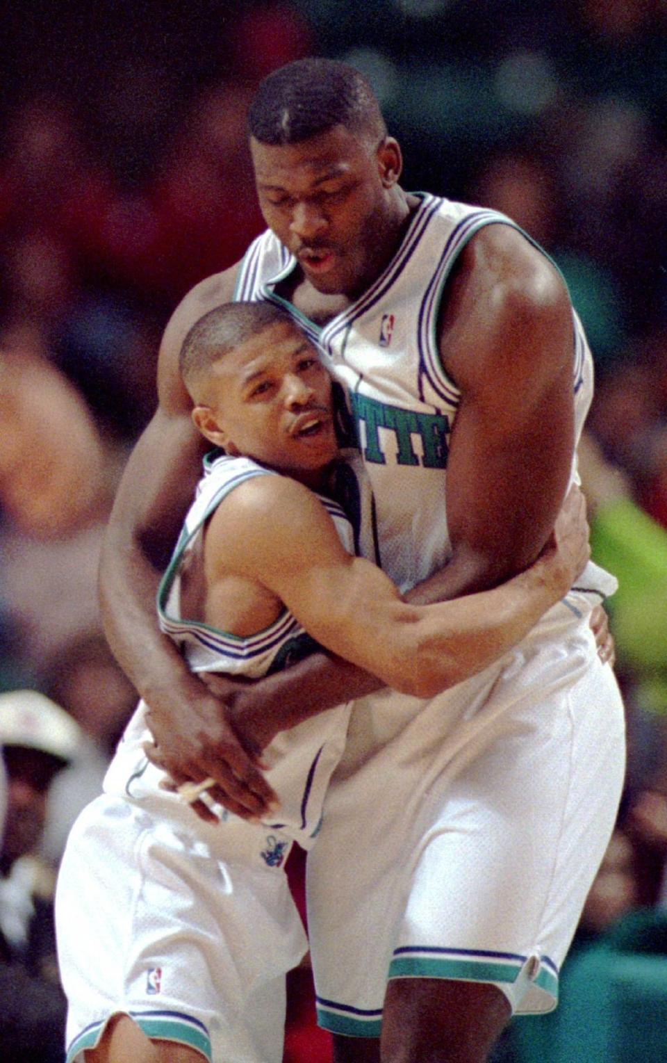 Muggsy Bogues (left) and Larry Johnson (right) were one of the NBA’s most popular pairings during their time together with the Charlotte Hornets in the mid-1990’s.