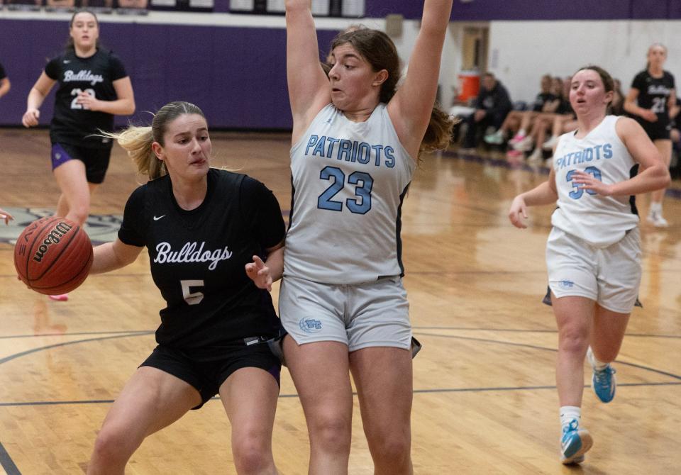 Rumson Raquel Guidetti drives to basket against Freehold Madison Sciarrino. Rumson-Fair Haven Girls basketball defeats Freehold Township in Rumson NJ on February 6, 2024.