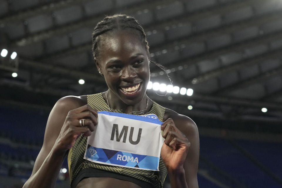 Athing Mu of the United States celebrates after winning the the women's 800-meter competition at the Golden Gala Pietro Mennea IAAF Diamond League athletics meeting in Rome, Thursday, June 9, 2022. (AP Photo/Andrew Medichini)