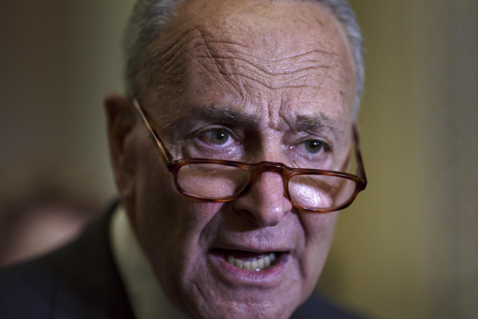 FILE - In this Sept. 21, 2021, file photo Senate Majority Leader Chuck Schumer, D-N.Y., criticizes Republicans as he speaks to reporters after a weekly policy meeting, at the Capitol in Washington. (AP Photo/J. Scott Applewhite, File)