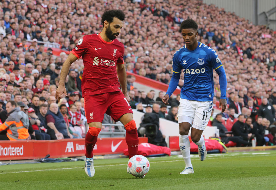 LIVERPOOL, ENGLAND - APRIL 24: Mohamed of Liverpool under pressure from Everton's Demarai Gray during the Premier League match between Liverpool and Everton at Anfield on 24 April 2022 in Liverpool, England Sarah. (Photo by Rich Linley - CameraSport via Getty Images)