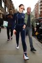 <p>In a Visitor on Earth tracksuit with Kith x Nike hightop sneakers, an Alexander Wang fanny pack, and Andy Wolf Ojala sunglasses while out in London.</p>