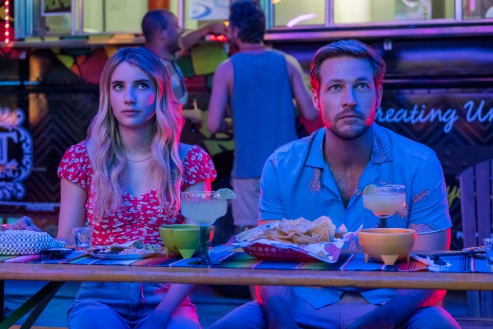 Emma Roberts and Luke Bracey in ‘Holidate’ (Steve Dietl/NETFLIX)