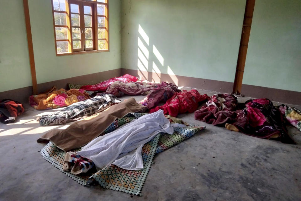 The bodies of the victims killed by airstrikes are shrouded in blankets at a building in Kanan village, Khampat town in Sagaing region on Sunday, Jan.7, 2024. Airstrikes by Myanmar’s military on a village under the control of the pro-democracy resistance in the country’s northwest are reported to have killed at least 17 civilians, including nine children. (AP Photo)