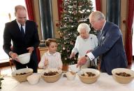 <p>To round out the year and boost the holiday cheer, Buckingham palace released a photograph of Queen Elizabeth and her heirs, Price Charles, Prince William, and Prince George preparing special Christmas puddings together in the Music Room at Buckingham Palace. The photo was part of the launch of the Royal British Legion's Together at Christmas Initiative in London. </p>