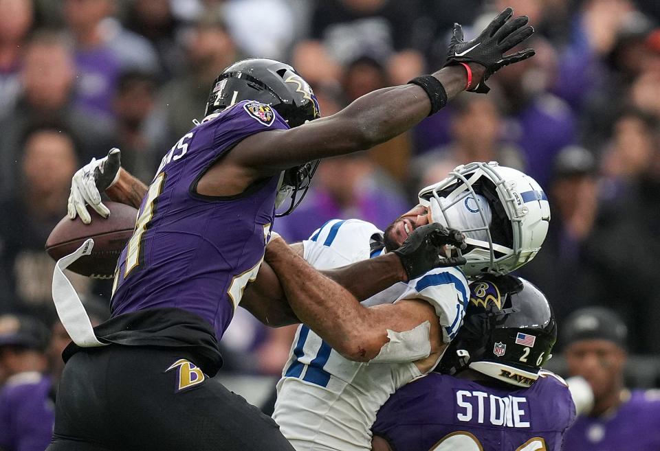 Indianapolis Colts wide receiver Michael Pittman Jr. (11) loses his helmet as he picks up a clutch catch in overtime against Baltimore Ravens on Sunday, Sept. 24, 2023, at M&T Bank Stadium in Baltimore.