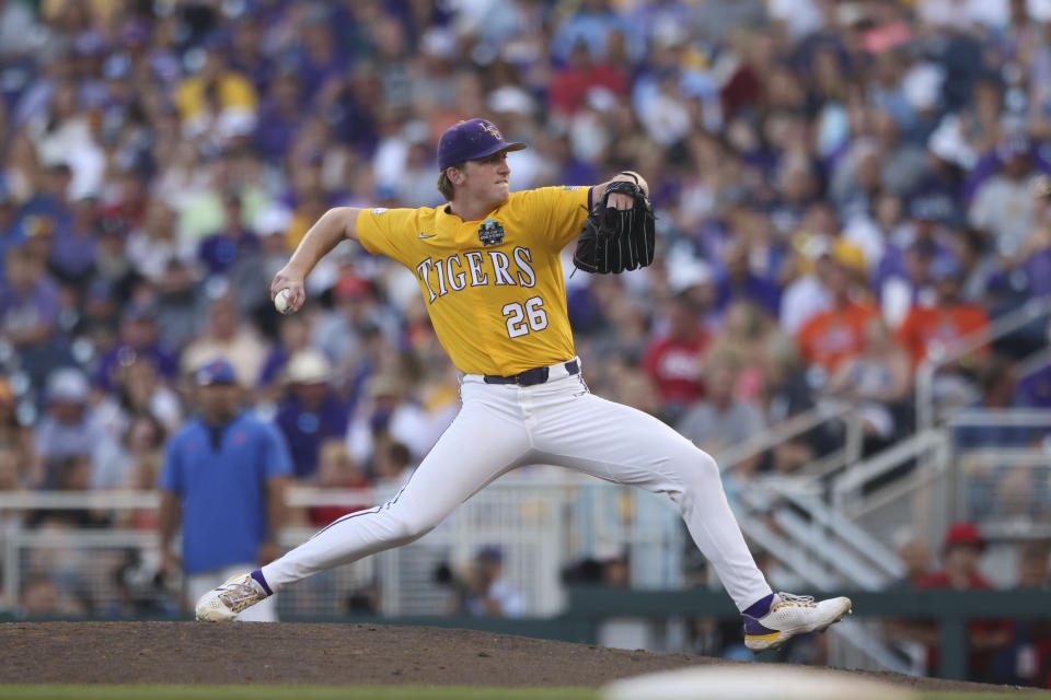 LSU pitcher Thatcher Hurd (26) throws in the sixth inning of Game 3 of the NCAA College World Series baseball finals against Florida in Omaha, Neb., Monday, June 26, 2023. (AP Photo/Rebecca S. Gratz)