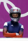 FILE - In this Feb. 18, 2014 file photo, Nadezhda Sergeeva, of Russia, prepares for the first run during the women's two-man bobsled competition at the 2014 Winter Olympics, in Krasnaya Polyana, Russia. Sergeeva tested positive for trimetazidine at the 2018 Pyeongchang Olympics. She was disqualified from the two-woman bob event and served an eight-month ban.(AP Photo/Natacha Pisarenko, File)