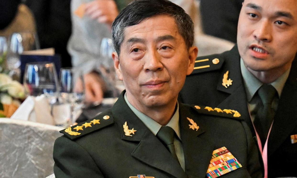 <span>Li Shangfu, who was sacked as defence minister in October, two months after he disappeared from public life.</span><span>Photograph: Caroline Chia/Reuters</span>