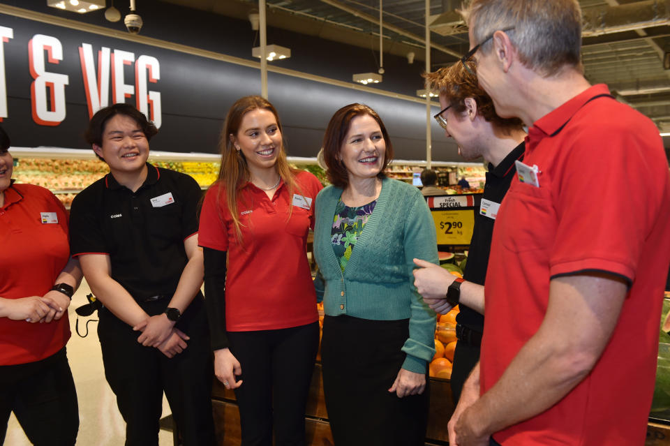 Mary Brockhoff, centre, had a cardiac arrest in store and survived, thanks to the early intervention from the Coles employees. Source: Supplied/Coles