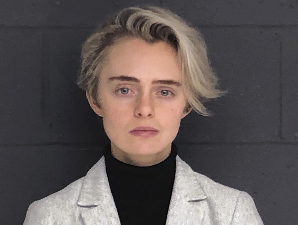 FILE - This Feb. 11, 2019, booking photo released by the Bristol County Sheriff's Office shows Michelle Carter. The Massachusetts woman sentenced to 15 months in jail for urging her suicidal boyfriend via text messages to take his own life is asking for early release. Carter is scheduled to appear Thursday, Sept. 19 before the state Parole Board after serving seven months. She was convicted in 2017 of involuntary manslaughter in the death of 18-year-old Conrad Roy III. (Bristol County Sheriff's Office via AP, File)