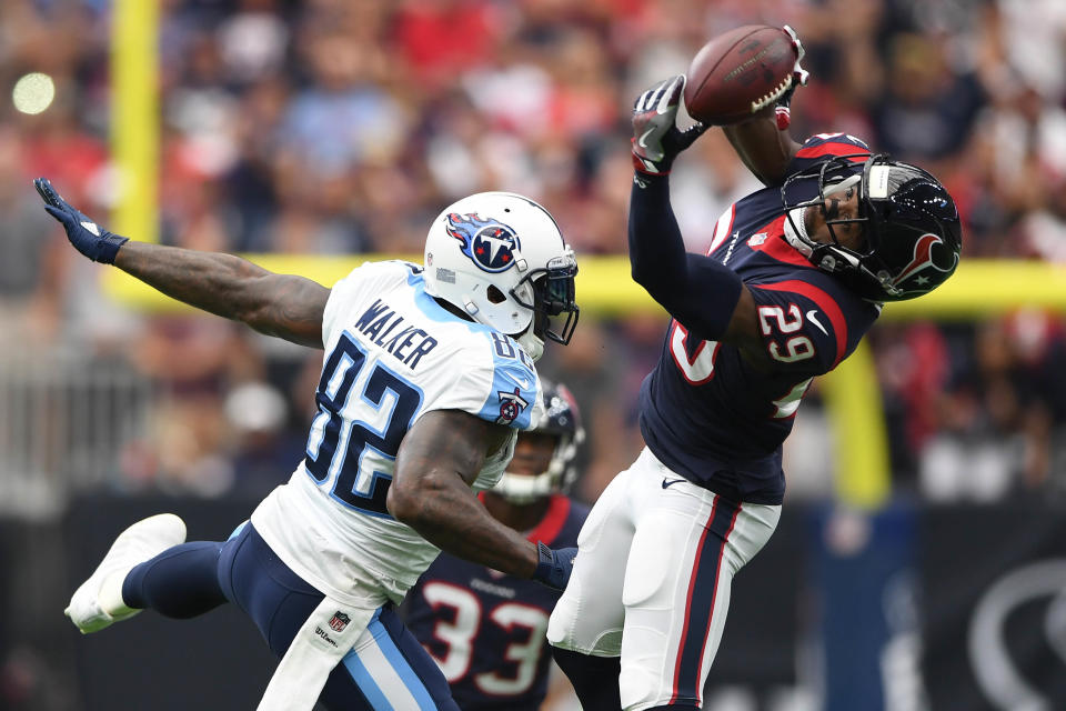 <p>Houston Texans free safety Andre Hal (29) intercepts a pass intended for Tennessee Titans tight end Delanie Walker (82) during the first quarter at NRG Stadium. Mandatory Credit: Shanna Lockwood-USA TODAY Sports </p>