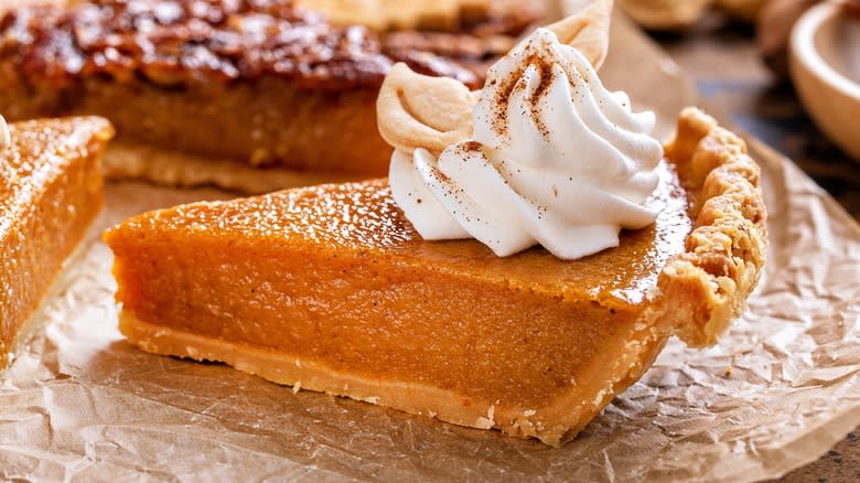 Pumpkin pie slice with cream