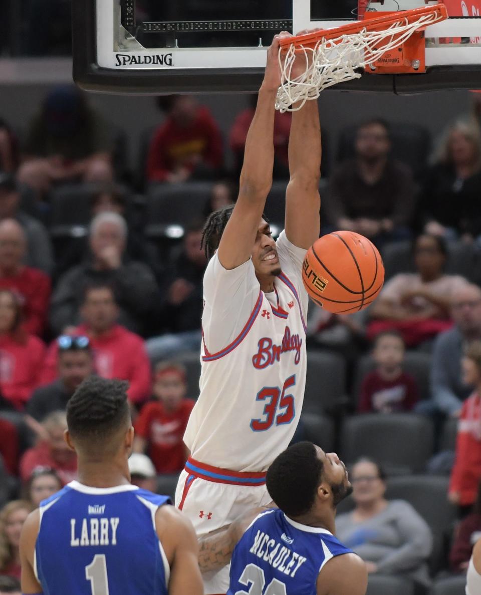 Mar 4, 2023; St. Louis, MO, USA;  Bradley Braves forward Darius Hannah (35) dunks the ball during the second half against the Indiana State Sycamores at Enterprise Center.