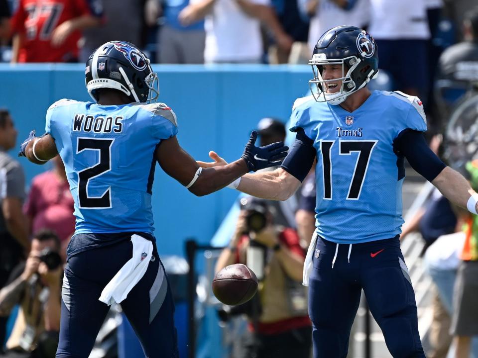 Robert Woods celebrates with Ryan Tannehill after a touchdown against the Las Vegas Raiders.