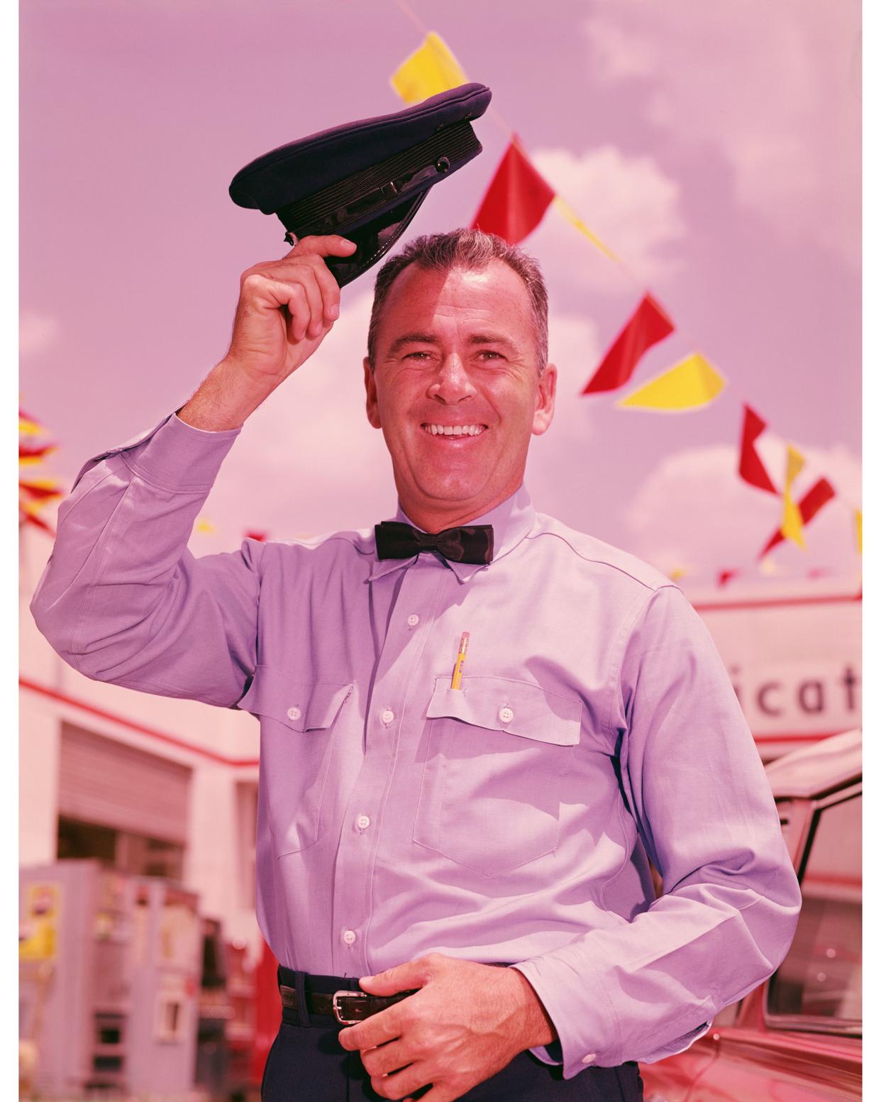 Old-fashioned gas station attendant