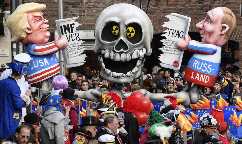 A carnival float depicts Donald Trump and Vladimir Putin cutting the INF Treaty during to the traditional carnival parade in Duesseldorf, Germany, on Monday, March 4, 2019. The foolish street spectacles in the carnival centers of Duesseldorf, Mainz and Cologne, watched by hundreds of thousands of people, are the highlights in Germany's carnival season on Rosemonday. (AP Photo/Martin Meissner)