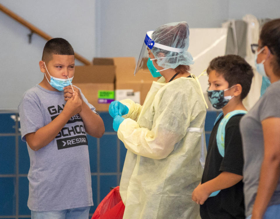 teachers and students wearing masks for COVID safety