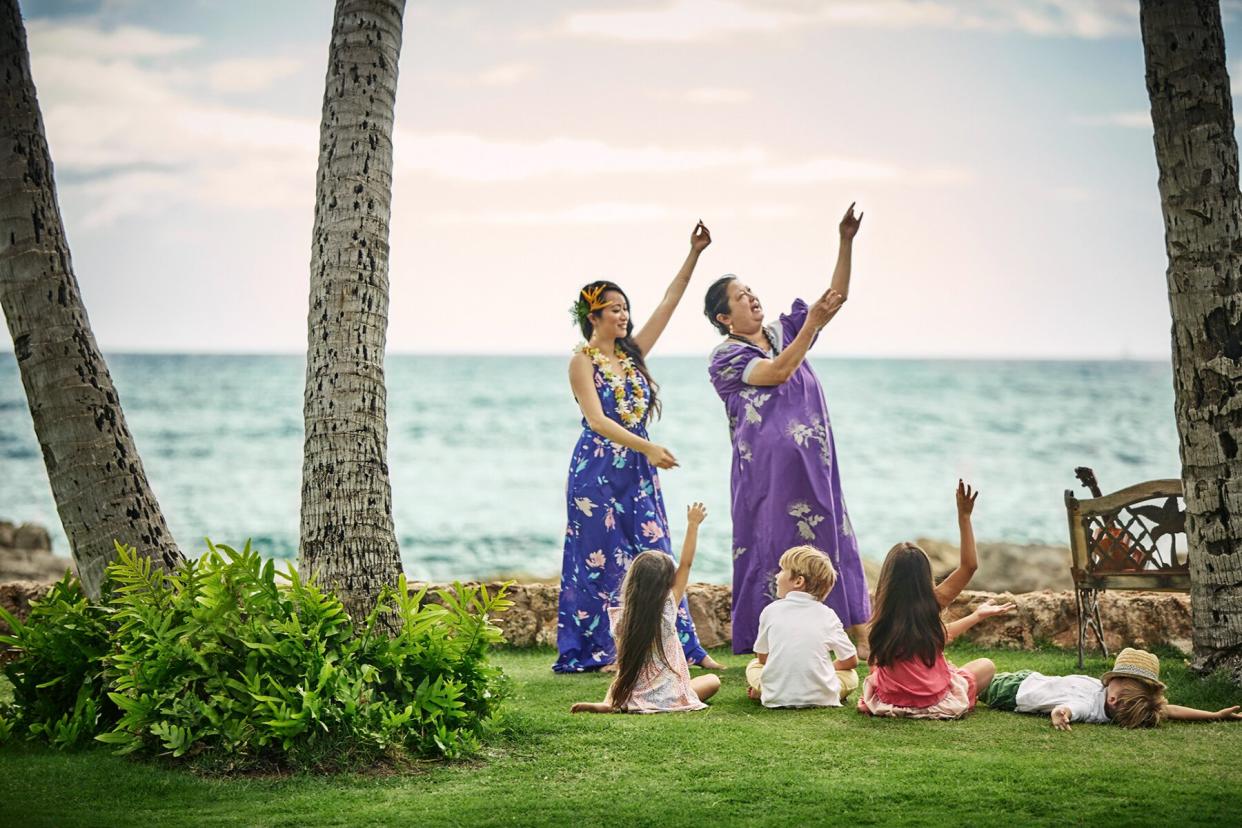 Children learning traditional dance at Four Seasons Resort Oahu at Ko`olina