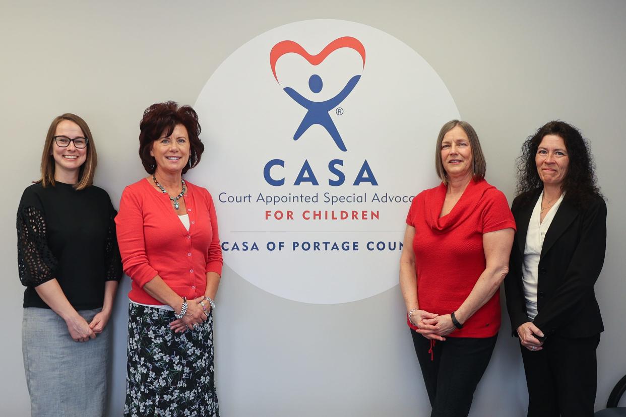 From left are CASA of Portage County Executive Director Ann Walden,  Judge Patricia J. Smith, CASA volunteer Leslie Thomas and Portage County Court Administrator/Magistrate Heather Gyekenyesi.