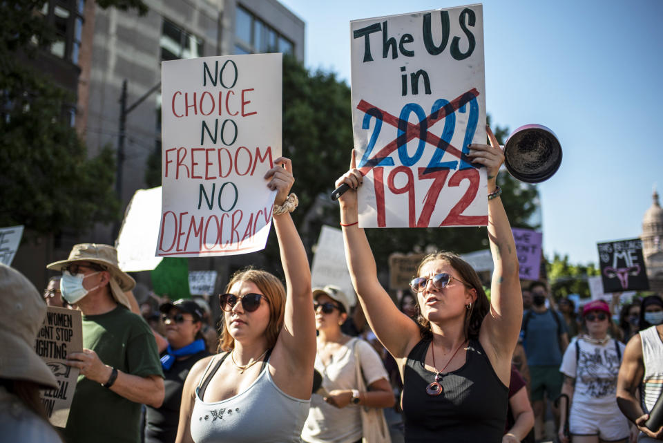 Demonstrators march during an abortion rights rally (Sergio Flores / Getty Images)