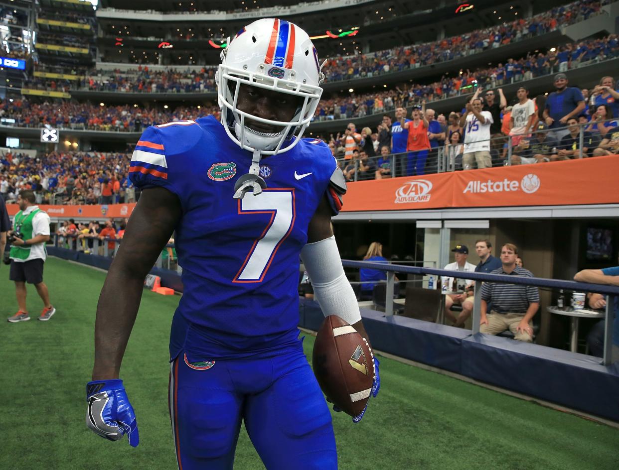 Florida’s Duke Dawson is better off using his hands to intercept passes than hitting opponents helmets. (Getty Images)