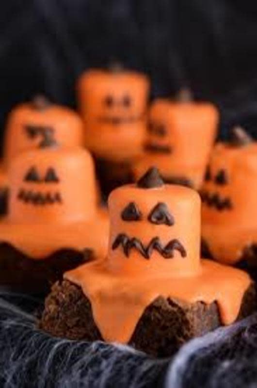 <p>Dixie Crystals</p><p>Melting Jack-O'-Lanterns drip their candy marshmallow goodness all over rich chocolate brownies. This kid-friendly recipe will have your Halloween party-goers cackling with delight.</p><p><strong>Get the recipe: <a href="https://www.dixiecrystals.com/recipes/melted-jack-olantern-brownies/" rel="nofollow noopener" target="_blank" data-ylk="slk:Melted Jack-O'-Lantern Brownies;elm:context_link;itc:0;sec:content-canvas" class="link rapid-noclick-resp">Melted Jack-O'-Lantern Brownies</a></strong></p>
