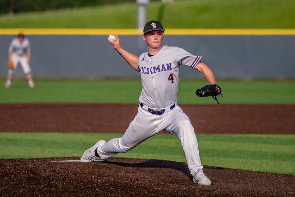 Hickman's Braden Hemmer (4) delivers a pitch during the Kewpies' 3-0 win over Battle last season.