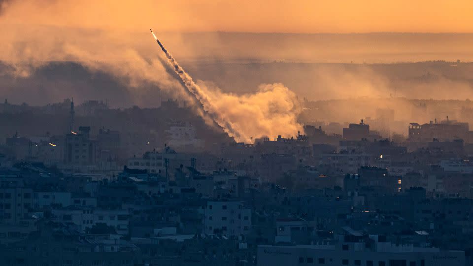 Rockets are fired toward Israel from the Gaza Strip on Saturday.  - Fatima Shbair/AP