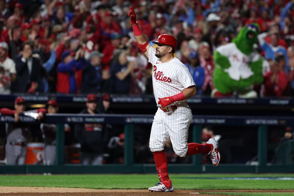 Kyle Schwarber celebrates his first home run in Game 2.