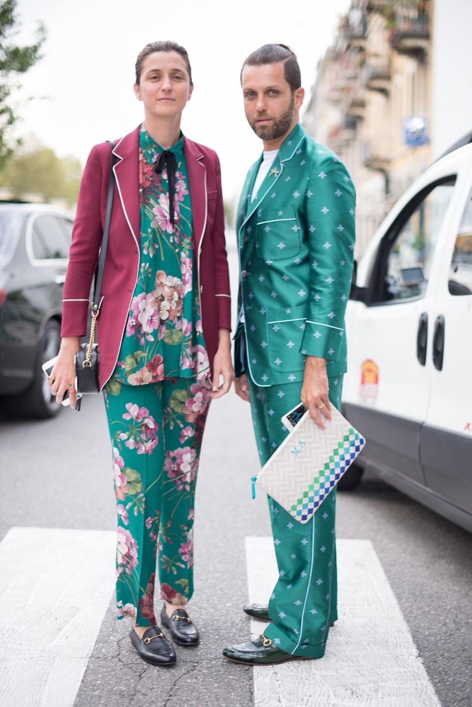 Twinning: a street style duo wear his and hers green pajamas.