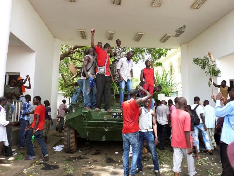FILE PHOTO: Protesters occupy Mali's presidential palace in the capital Bamako