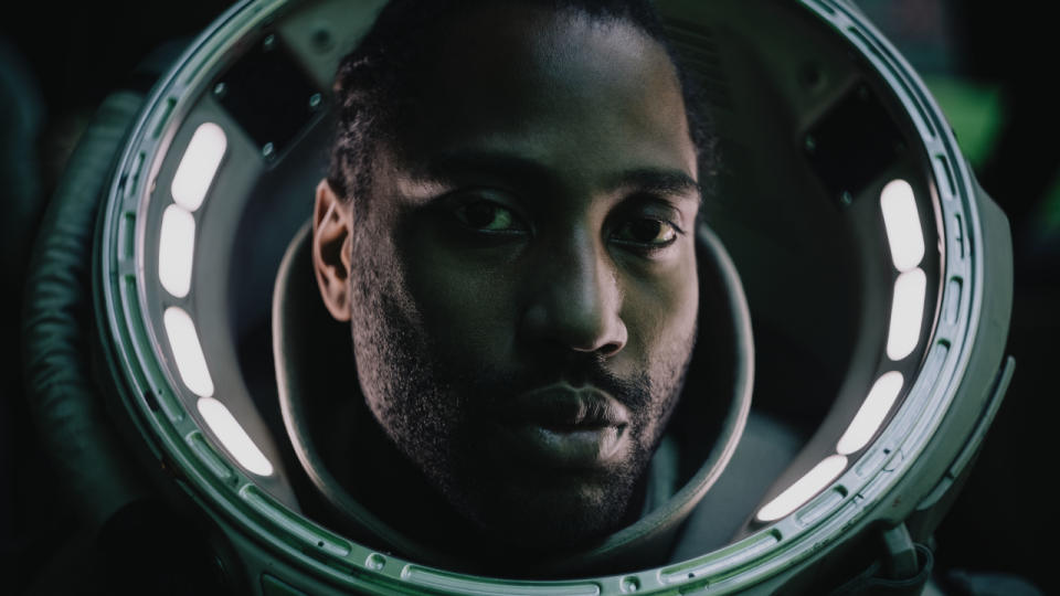 John David Washington shown in close up wearing a spacesuit in The Creator.