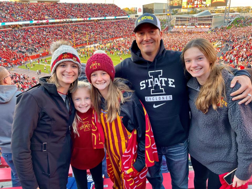 From left: Ann, Kendall, Mia, Chris and Aubrey Schwieso enjoy an Iowa State football game at Jack Trice Stadium in Ames.